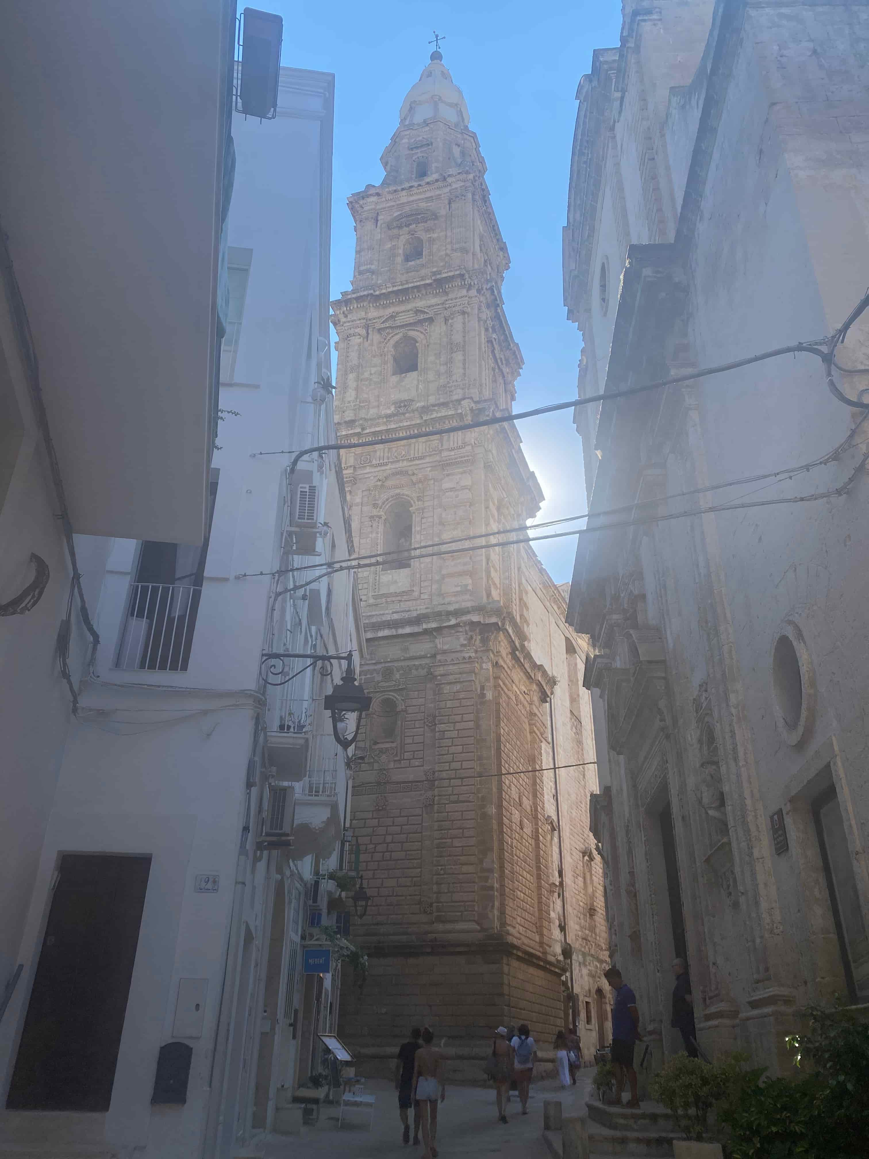 San Leonardo Bell Tower in the middle of the white washed Monopoli alleys