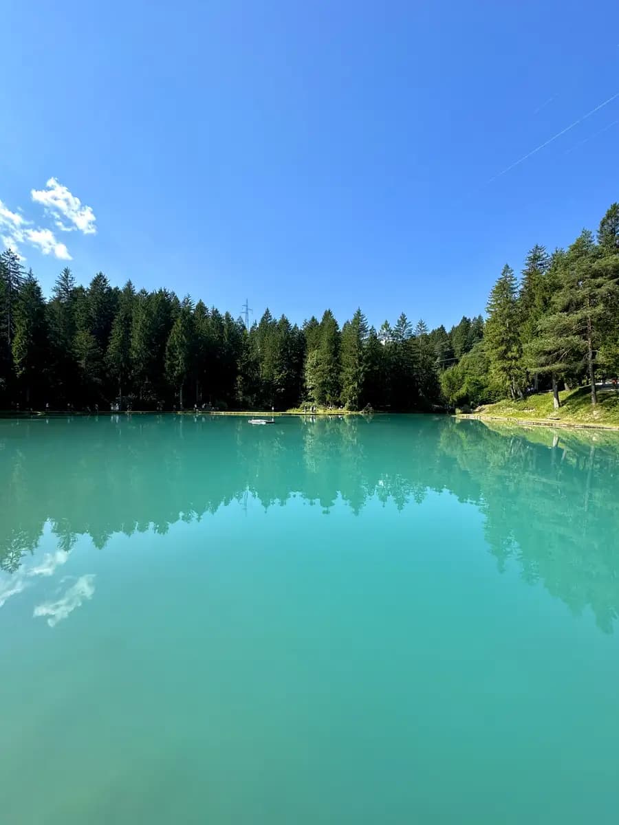 the beautiful colour of lake cadore dolomites