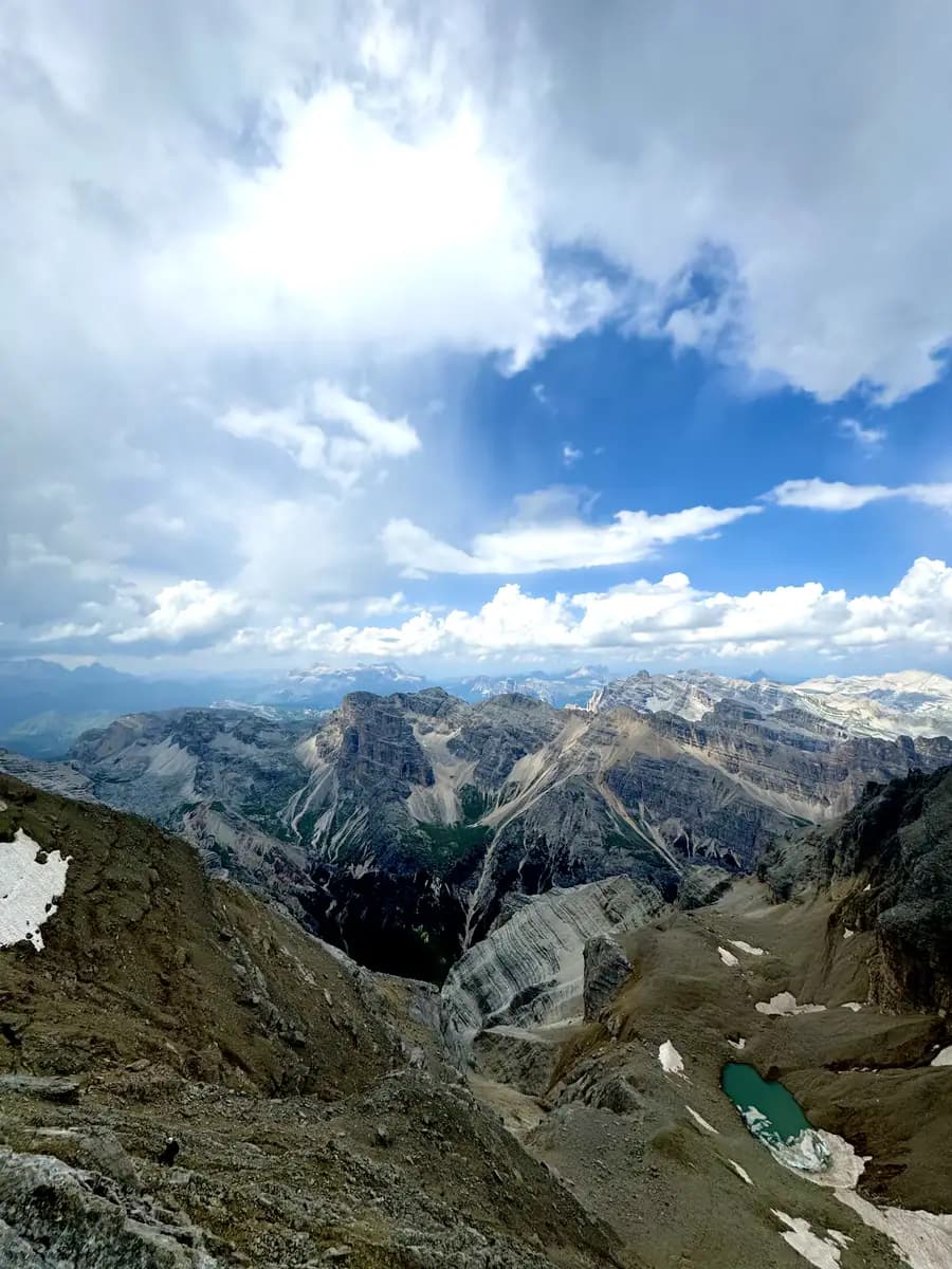 view from the tip of cima tofana di mezzo dolomites rugged mountains