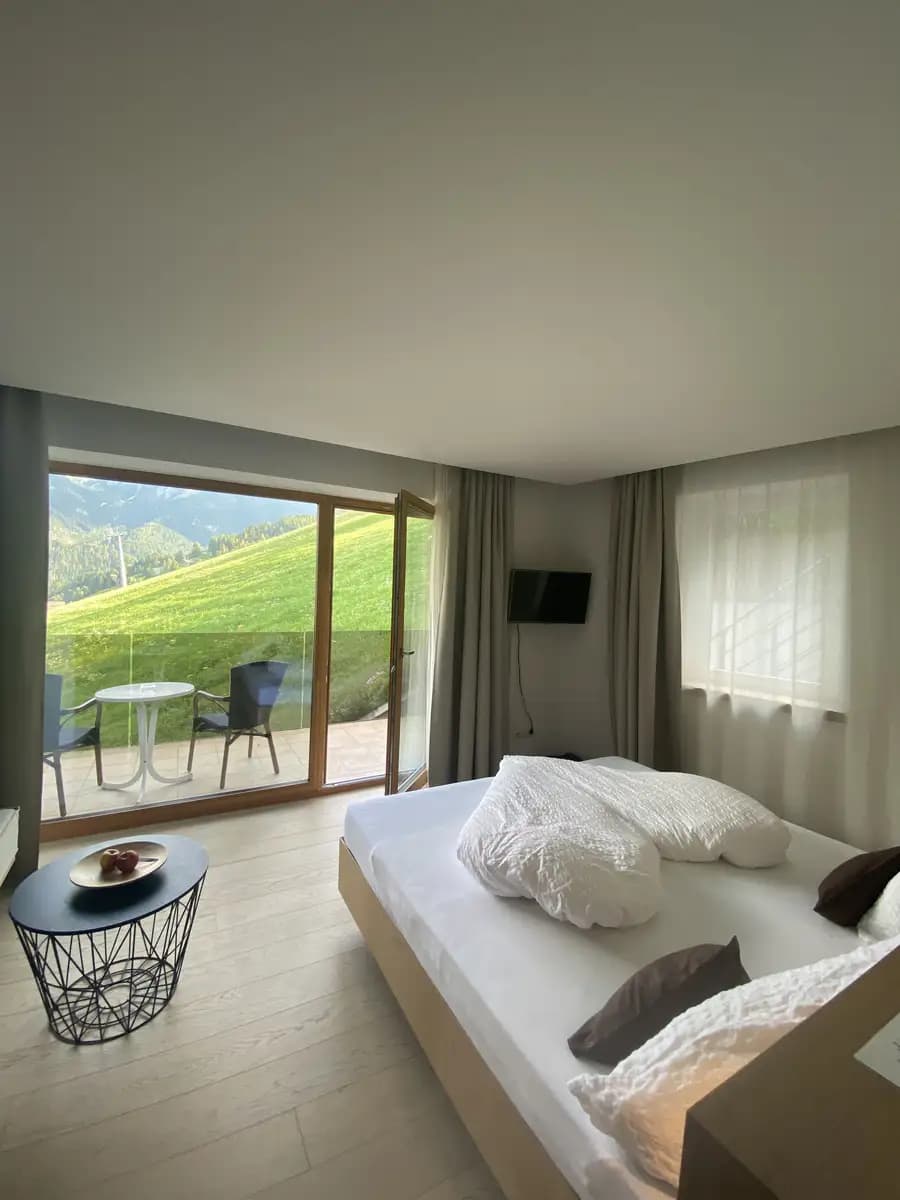 hotel room with amazing view of the mountains in kronplatz right by ski lift