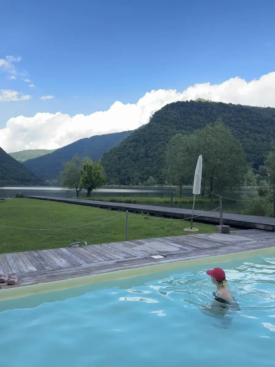 enjoying the day at lake segrino at the lido with the swimming pool