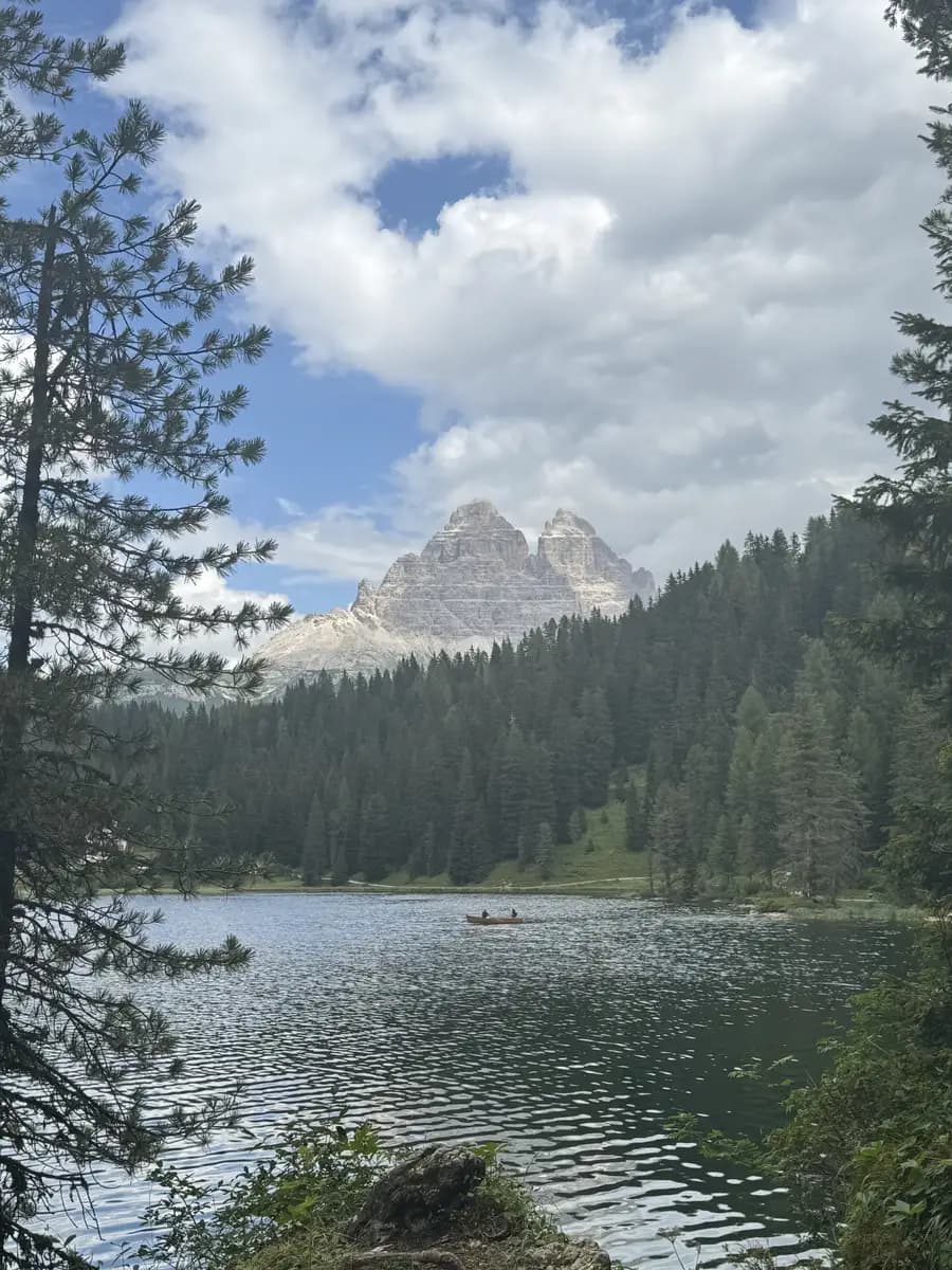 view of lago di misurina with the forest and mountain view in the backround