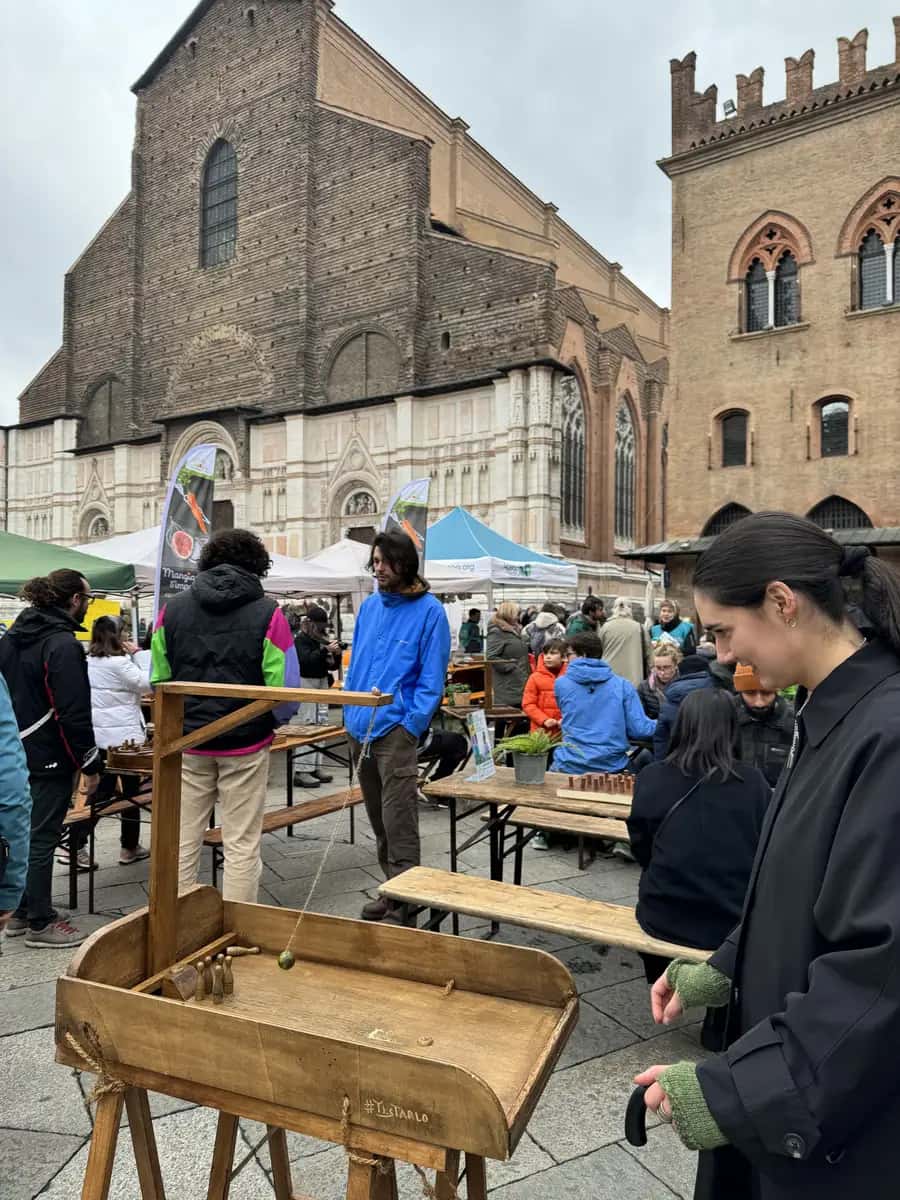 catherine of bologna saints day in piazza maggiore bologna with some fun wooden games
