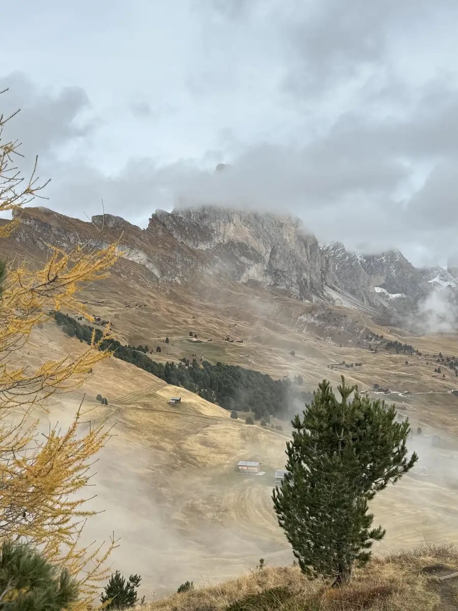 pic hike seceda dolomites view of the valley on a cloudy autumn day