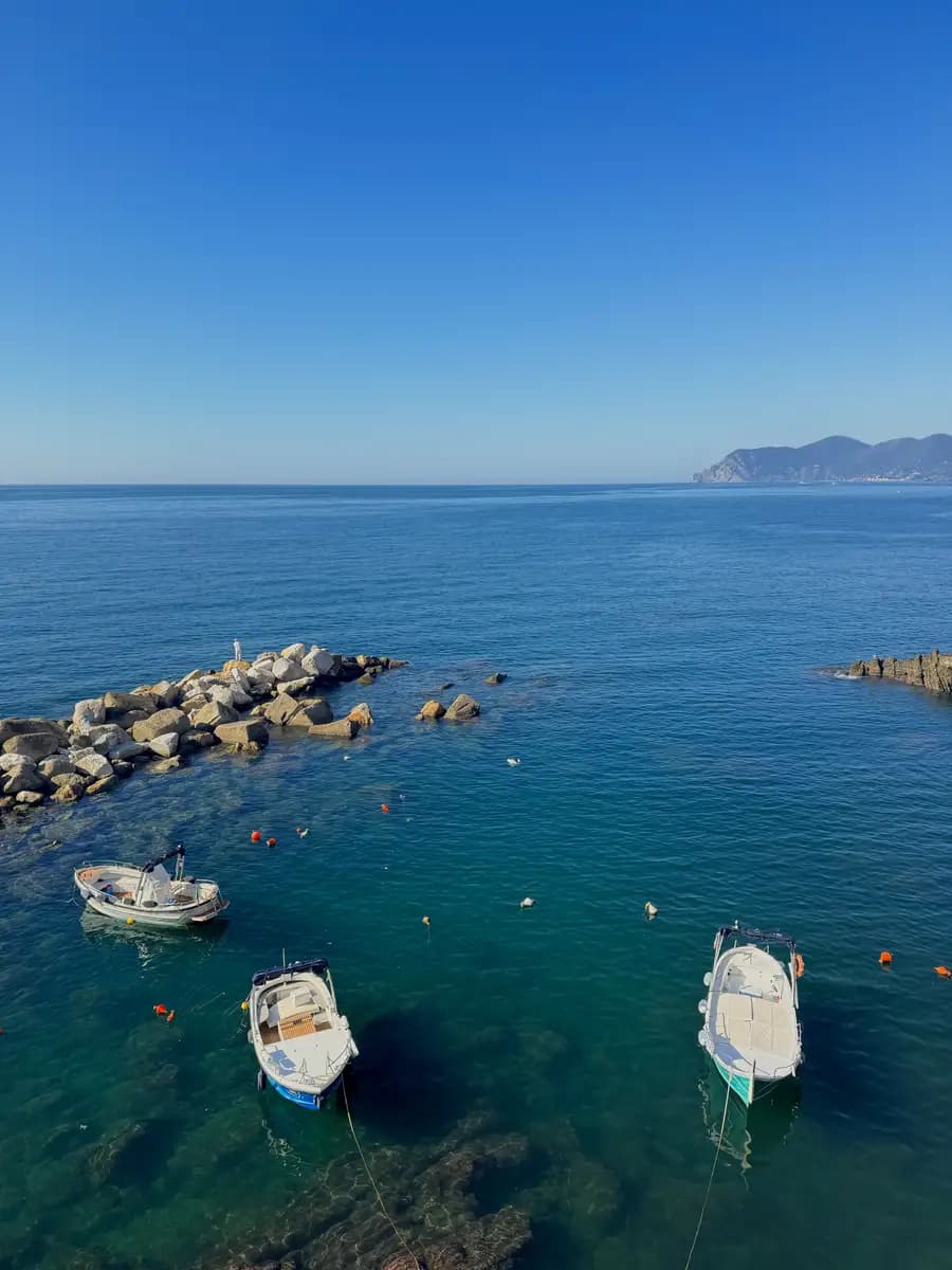 riomaggiore cinque terre harbour view in october on a sunny day blue water