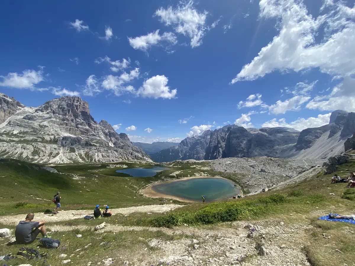 three small lakes with the mountains in the background in the tre cime di lavaredo hike trail