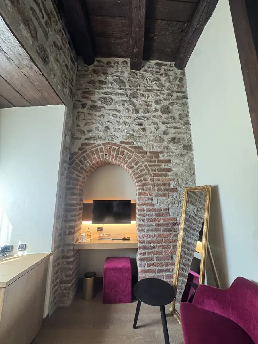 stone walls and historic castle walls inside our hotel room